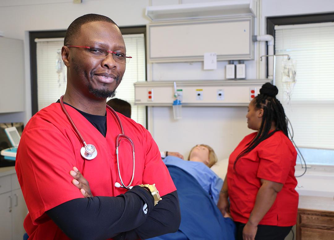 Practical Nursing. Nursing students in classroom lab. Nursing Program. Students in nursing program. Diverse, affordable. CNA. PN. RN. Registered Nurse, Practical Nurse, Certified Nurse Aide. Pass rate. Donnelly College in Kansas City, Kansas. Certificate and Degree. Associate degree and Bachelor's degrees pathways. 